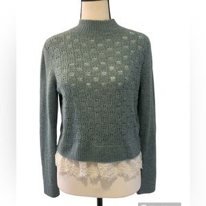 Divided | crop sweater with lace trim.